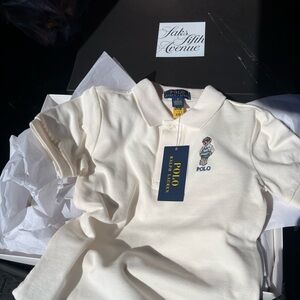 NWT cream Ralph Lauren polo with large bear insignia